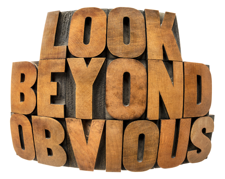 look beyond obvious in wood type - isolated text in fisheye lens perspective in vintage letterpress wood type